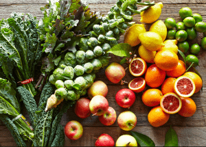 a group of fruits and vegetables on a wood surface Healthy Weight Loss Diets West Bridgford