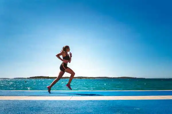 Woman running showing strong leg muscle West Bridgford
